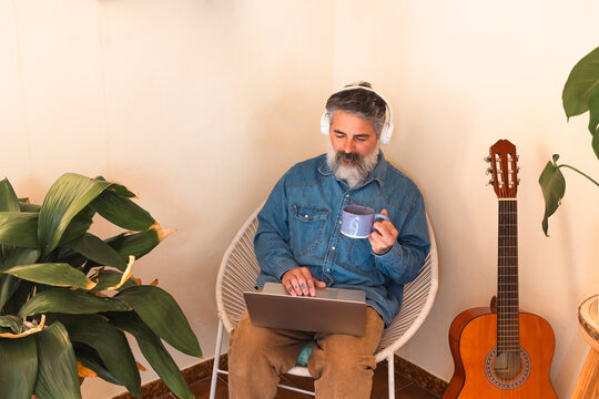 Man blending remote work and creative leisure for work-life balance