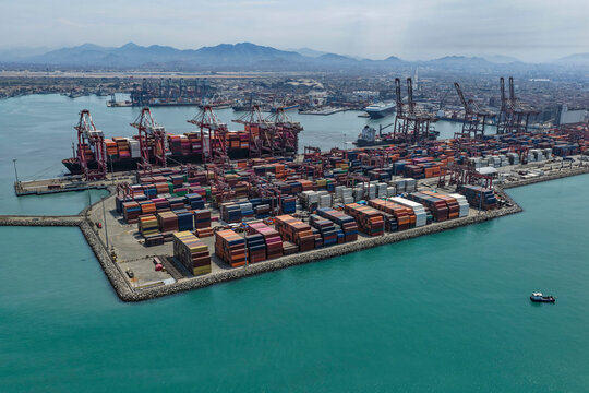 Panoramic view of terraforming for the construction of a port terminal protected with rock breakwaters