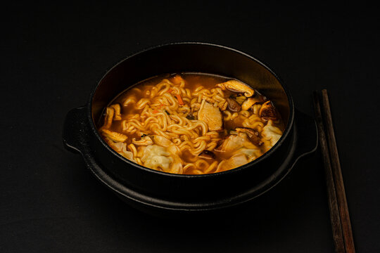 Steaming Spicy Ramen in Black Bowl