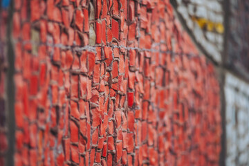 Vibrant textures of a colorful mosaic wall in an urban setting showcasing artistic expressions and vivid hues © Cristina