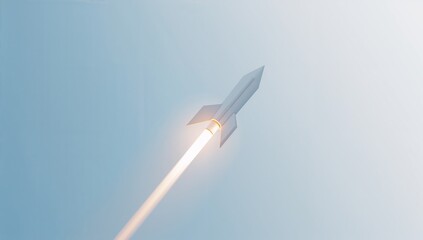 Fototapeta premium Modern Rocket Launching Into Clear Blue Sky Leaving Trail of Smoke