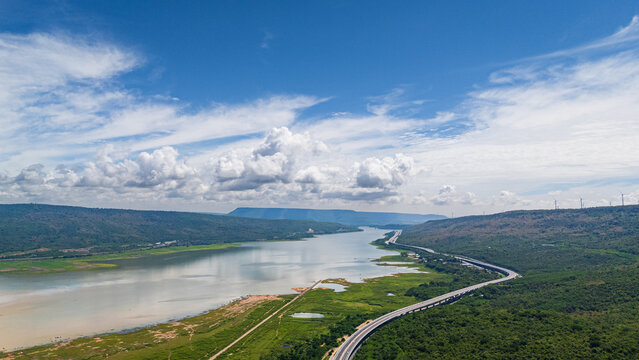 Drone shot The M6 motorway Nakhon Ratchasima Province - Bang Pa-in Lam Ta Khong River and Mountain. Motorway Korat Thailand