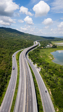 Drone shot The M6 motorway Nakhon Ratchasima Province - Bang Pa-in Lam Ta Khong River and Mountain. Motorway Korat Thailand
