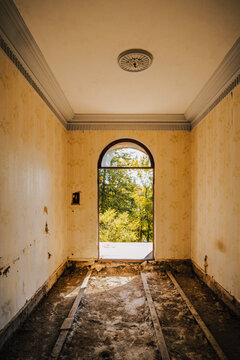 Abandoned interiors of Sanatorium Iveria in Tskaltubo, Georgia &mdash; Soviet-era decay slowly reclaimed by nature and time.