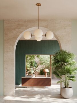 Elegant archway leading into a summer interior featuring a modern design with a chandelier, greenery, and a wooden reception desk in a stylish setting