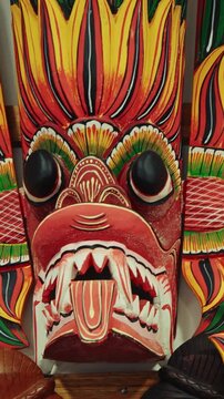 Ceylon Gini Raksha Fire Wooden Mask Sculpture. Sri Lankan Flower Bird Devil - Mal Gurulu Raksha- Mask which shows Garuda and a Serpent and is said to give Power and Fame. Fire Devil mask, Gini Raksha