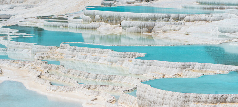 Pamukkale Travertines Drone Photo, An aerial view of the Pamukkale Travertines. Pamukkale Denizli, Turkiye (Turkey)