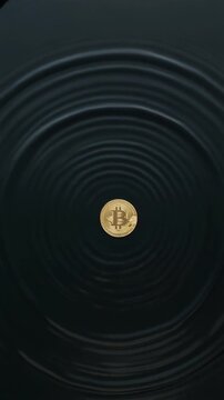Bitcoin cryptocurrency coin dropped into dark water creating ripples, close-up floating on surface, slow motion drop, symbolizing digital finance