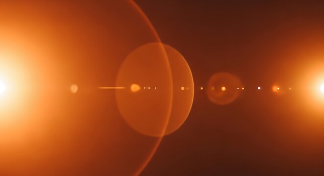 Bright Orange Lens Flare Effect with Bokeh and Light Streaks.