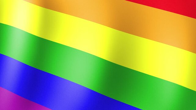Waving colorful of lgbt gay pride rainbow flag. Slow motion gay pride flag blowing in the wind.