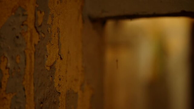 Cracked Plaster And Weathered Surface In Abandoned Building. Ruined Basement