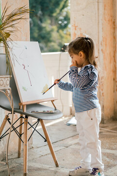 little girl painting