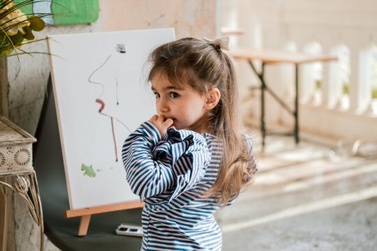 little girl painting