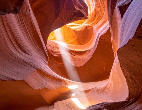 Abstract natural scene inside a canyon with flowing rock curves that look like waves, glowing light rays entering from above, unusual shapes