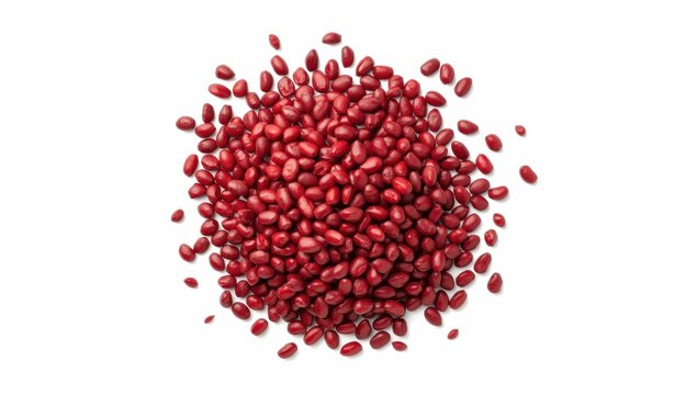Raw red adzuki beans stacked, Vigna angularis seeds, small dry azuki, red mung bean grains, used in Japanese desserts on a white background from above.