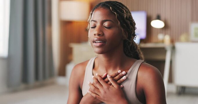 Yoga, breathing and black woman in home, fitness for health benefits and wellness. Apartment, yogi and African person in lounge, heart lungs and exercise for peace, routine and movement on floor