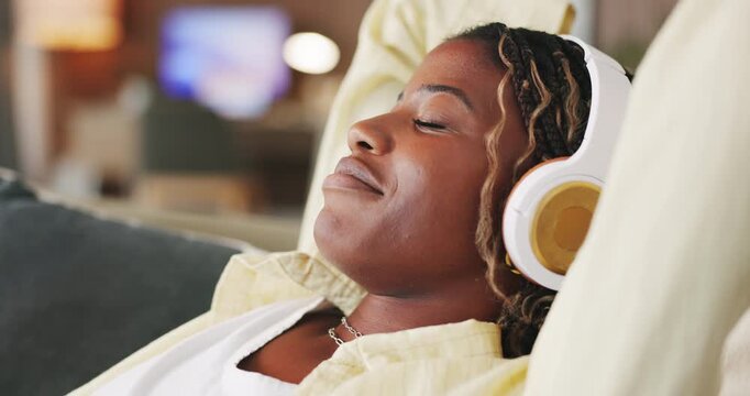 Relax, stretching and black woman with headphones in home, audiobook chapter and calming track. Chill, mindfulness podcast and happy person with audio tech for streaming music, listening and peace