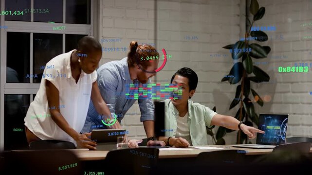 Seated man reacting to good crypto update on laptop colleagues checking tablet overlays appearing