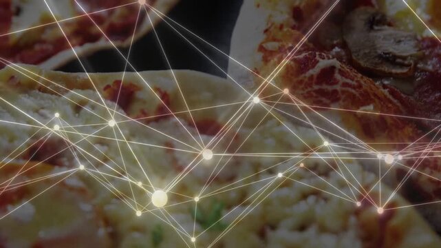 Network overlay appearing over pizza, pulsing, reforming and sliding as cam pans to focus on tomato