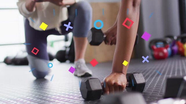 Trainer cueing tablet trainee performing alternating hex row graphic shapes showing form for health