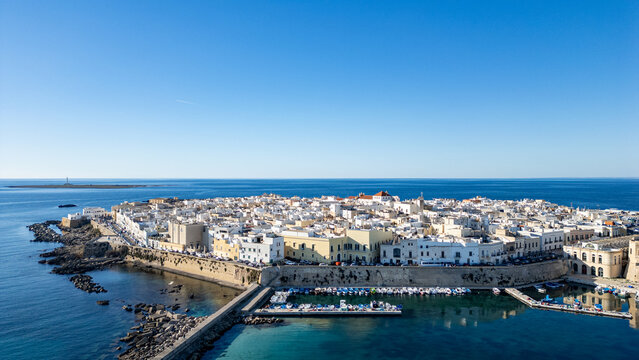 Aerial view of Gallipoli old town with fort, ramparts and harbor, Puglia, south Italy
