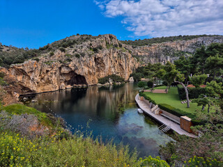 A beautiful view of Lake Vouliagmeni on the Vouliagmeni coast on the Saronic Gulf in Greece. © Frank Goma