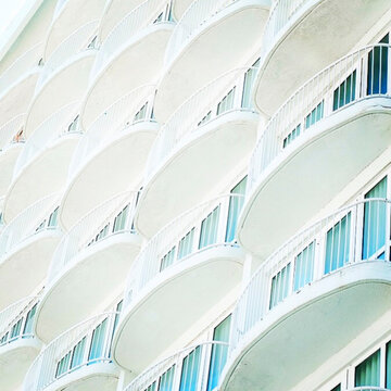 White curved balcony facade pattern