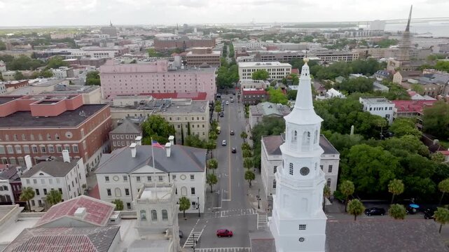 St. Michael's Episcopal Church and downtown in Charleston, South Carolina with drone video moving forward.