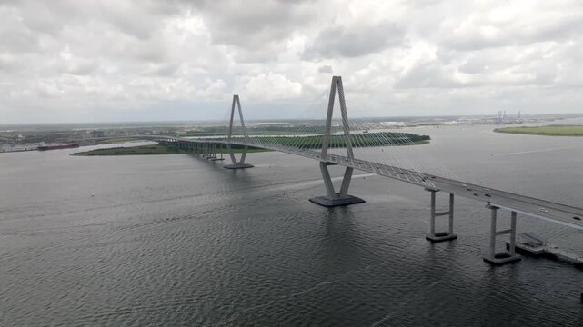 Ravenel Bridge in Charleston, South Carolina with traffic and stable drone video.