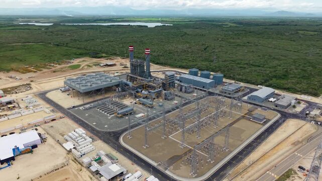 Expansive Power Plant And Electrical Substation Of Manzanillo Power Land In Dominican Republic. aerial orbiting shot