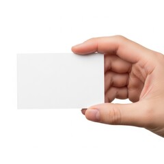 Obraz premium A hand holding a blank white business card isolated on a clean and simple white background surface
