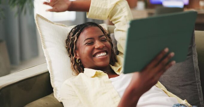Tablet, smile and black woman on sofa with comedy, internet movie or social media in home. Laughing, communication and student on couch with digital tech, app subscription or streaming in living room