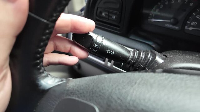 Close-up views of black car mirrors. Includes external side door mirrors and an internal rearview mirror attached to the windshield. Showing automotive parts and vehicle details.