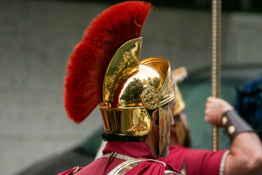 Roman centurion in golden helmet and red crest The Concept of historical heritage