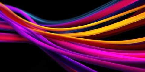 Fototapeta premium Bold colorful sweeping ribbons in hot pink purple orange and yellow on black creating vibrant contrast and dramatic flowing bands