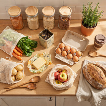 Fresh organic ingredients arranged on wooden kitchen countertop