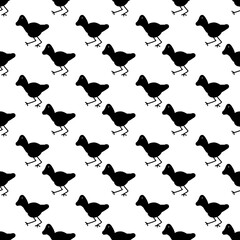 Seamless pattern of black bird silhouettes on a white background. Minimalist duckling or chick nursery wallpaper design in flat vector style. © Mr. Han Han