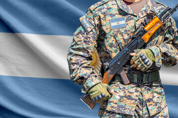 Obraz premium Argentina flag with soldier holding assault rifle