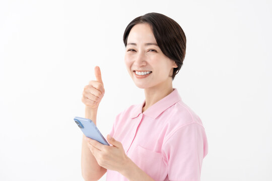 女性　スマホ　いいね