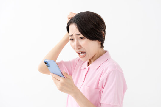 驚く　悩む　女性