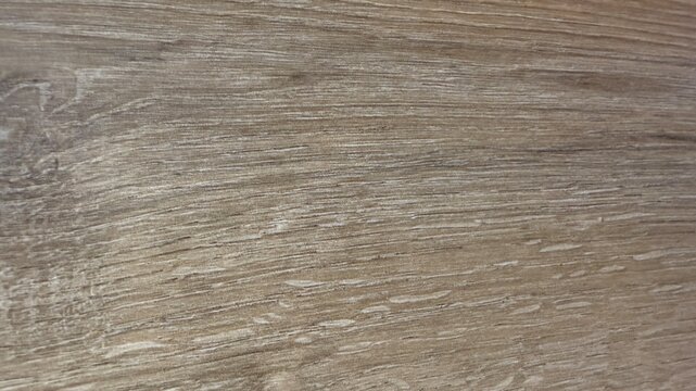 irregular patterns on wooden planks, multiplex wood planks, display natural textures and unique grain formations. Rustic and organic design elements with an artistic touch. Artistic background 