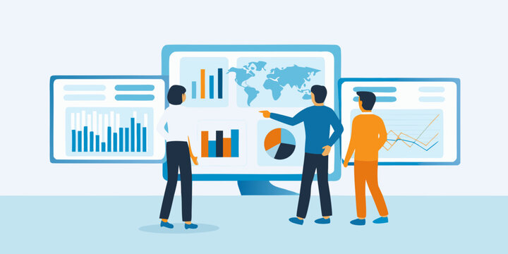 Team analyzing data visualizations on multiple computer screens