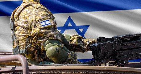 Obraz premium Israel flag with soldier at machinegun turret