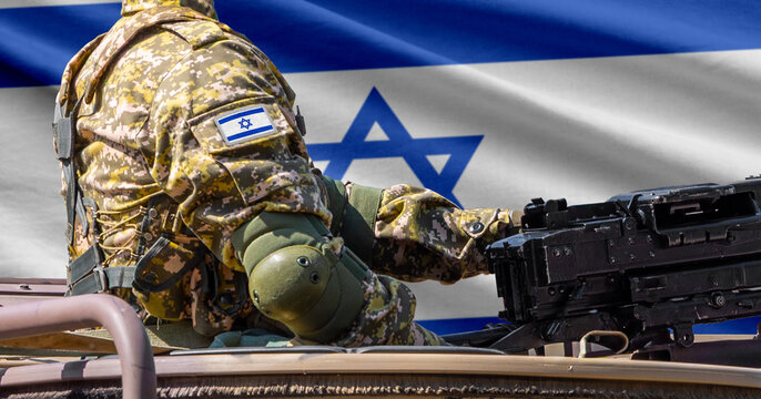 Israel flag with soldier at machinegun turret