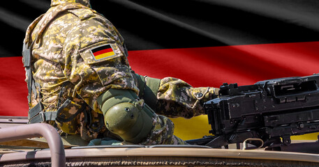 Germany flag with soldier at machinegun turret © lucky pics