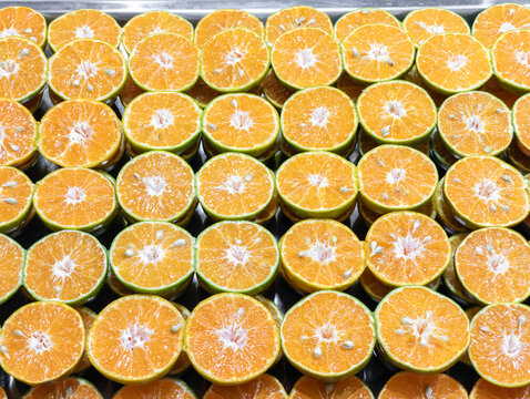 Fresh Halved Green Oranges Background