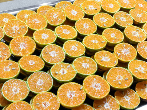 Fresh Halved Green Oranges Background