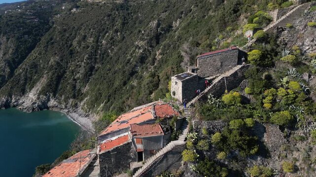 Italy, Liguria, La Spezia - Monesteroli in the Cinque Terre National Park is a small, almost uninhabited village famous for its 2,200-step staircase overlooking the sea, tourist trekking  walking path