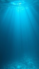 Obraz premium Explore the Tranquil Underwater World: A Serene Dive into the Blue Depths Beneath, Perfect for Relaxation and Nature Appreciation