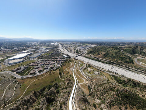 High Altitude Aerial View Of Interstate 5 Freeway Traffic Near The Los Angeles Aqueduct In California
